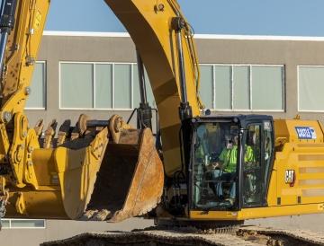 A person operating a piece of equipment