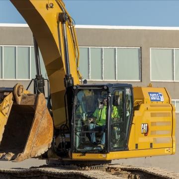 A person operating a piece of equipment