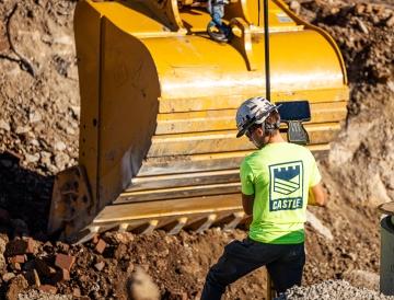 person working with excavator