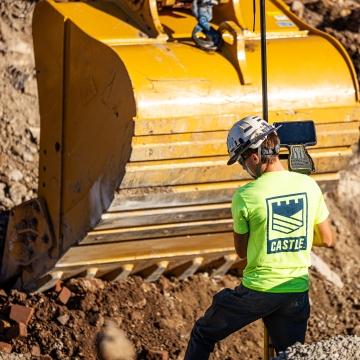 person working with excavator