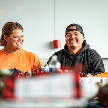 people laughing in a meeting