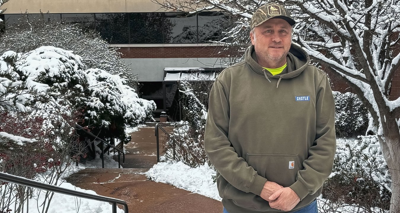 Billy Barton stands in front of Castle Contracting office