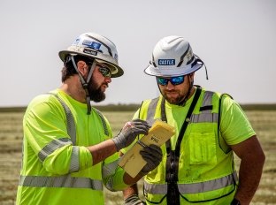 People Reviewing Notes